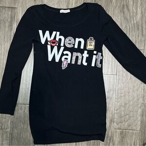 Black long sleeve dress with "When Want It"